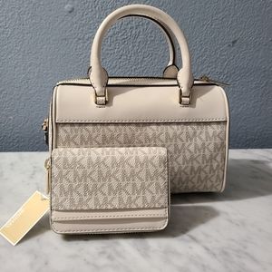 Michael kors small travel Duffle crossbody bag with a matching zipper wallet